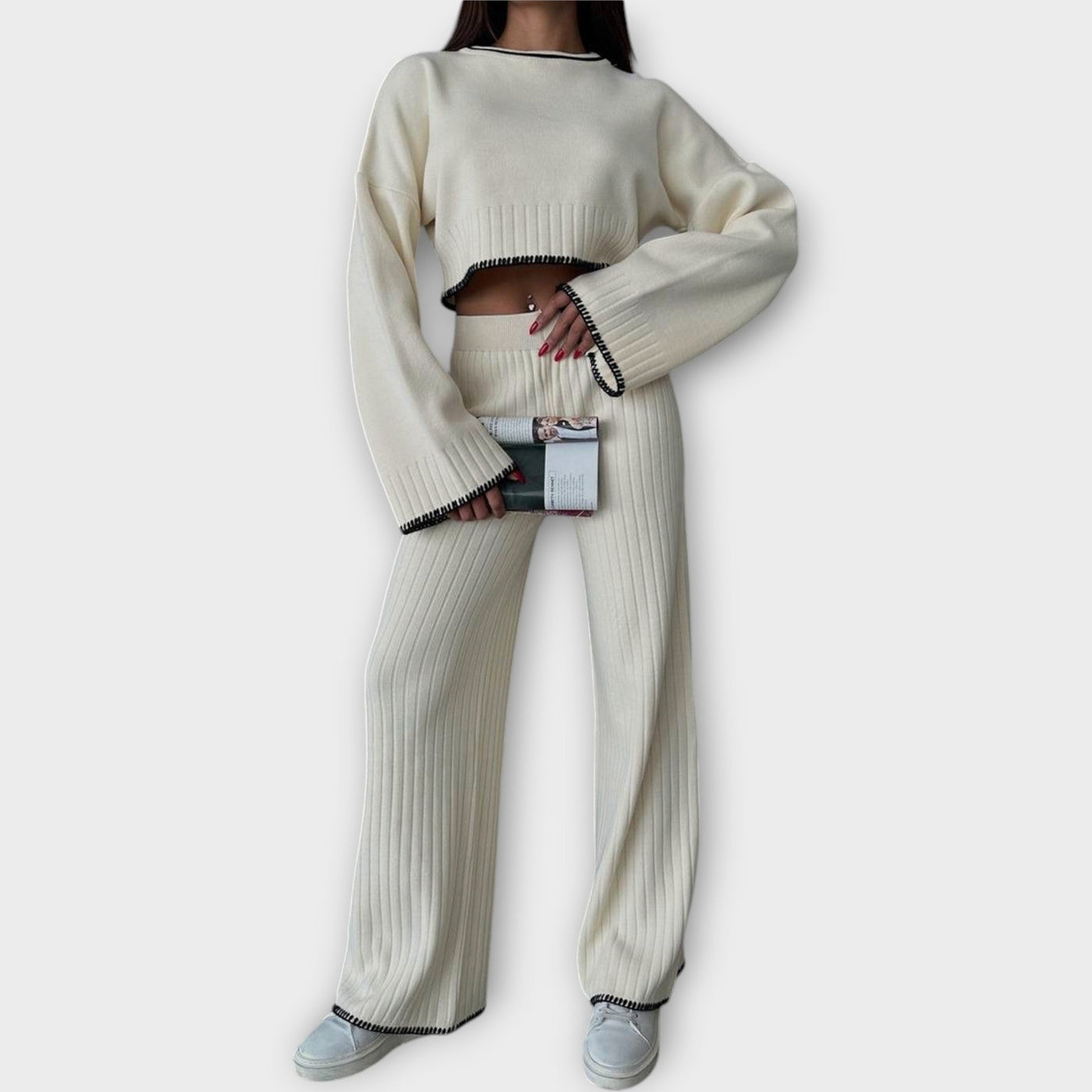 Knitted set with short blouse and fine details