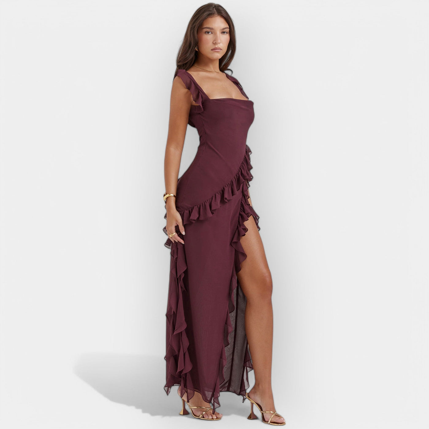 Dress with slit and ruffles