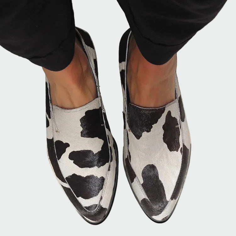 Cow print moccasins