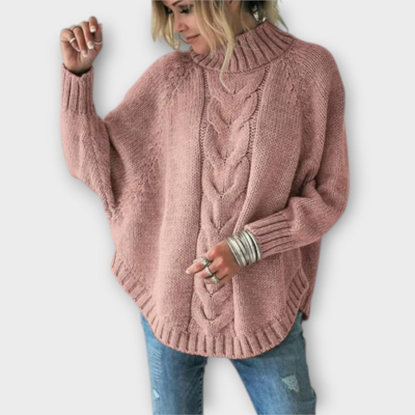 Knitted sweater with cable pattern