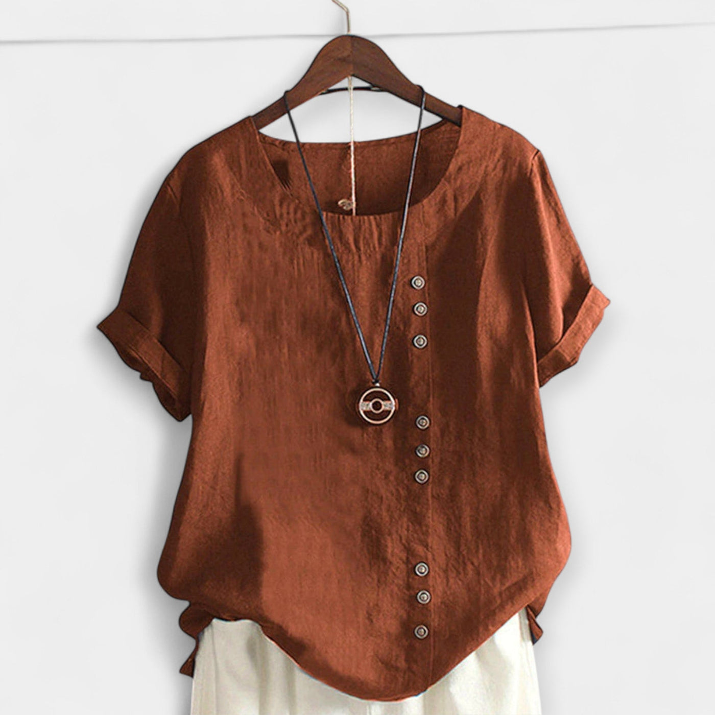 Blouse with buttons and short sleeves