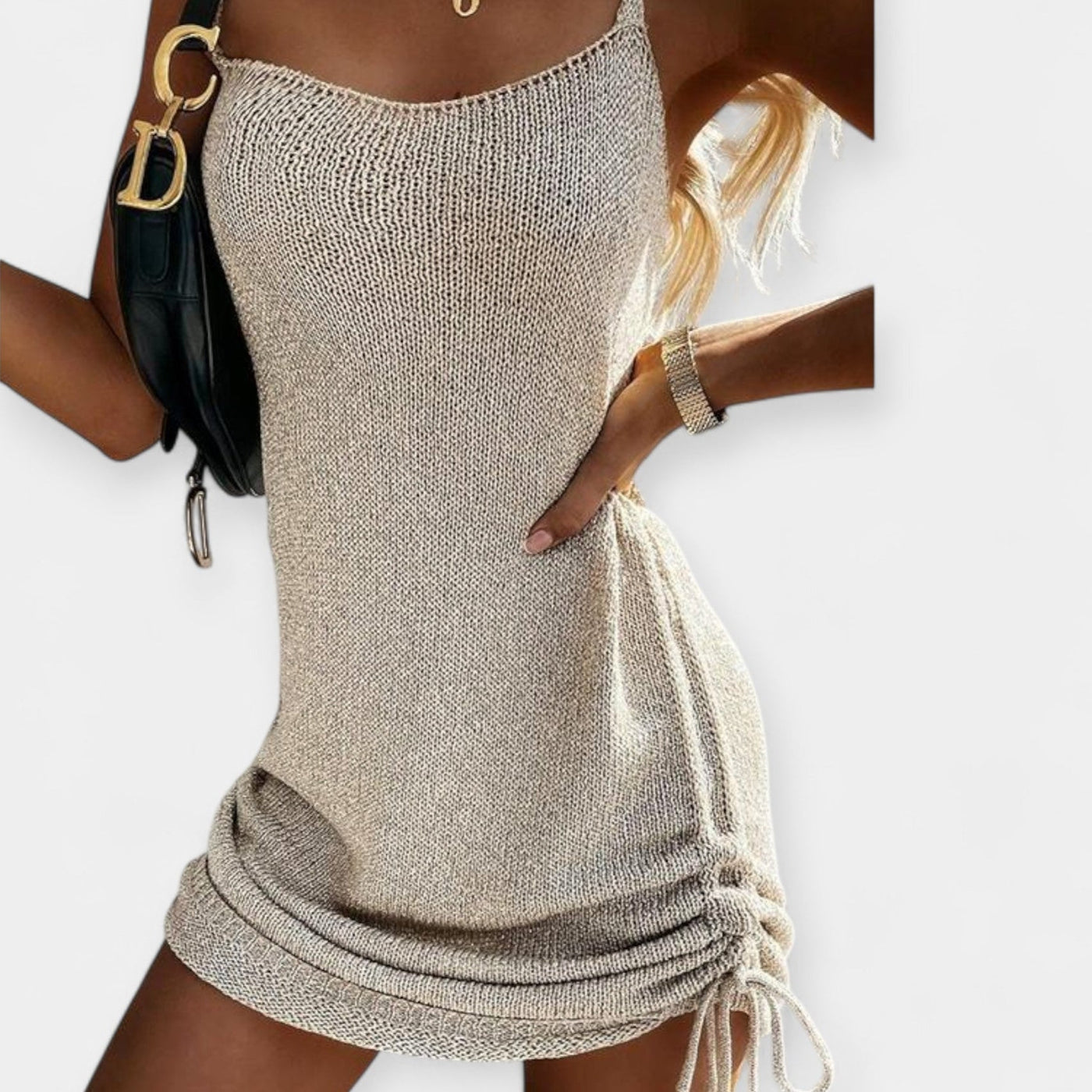 Sleeveless knitted dress with tie