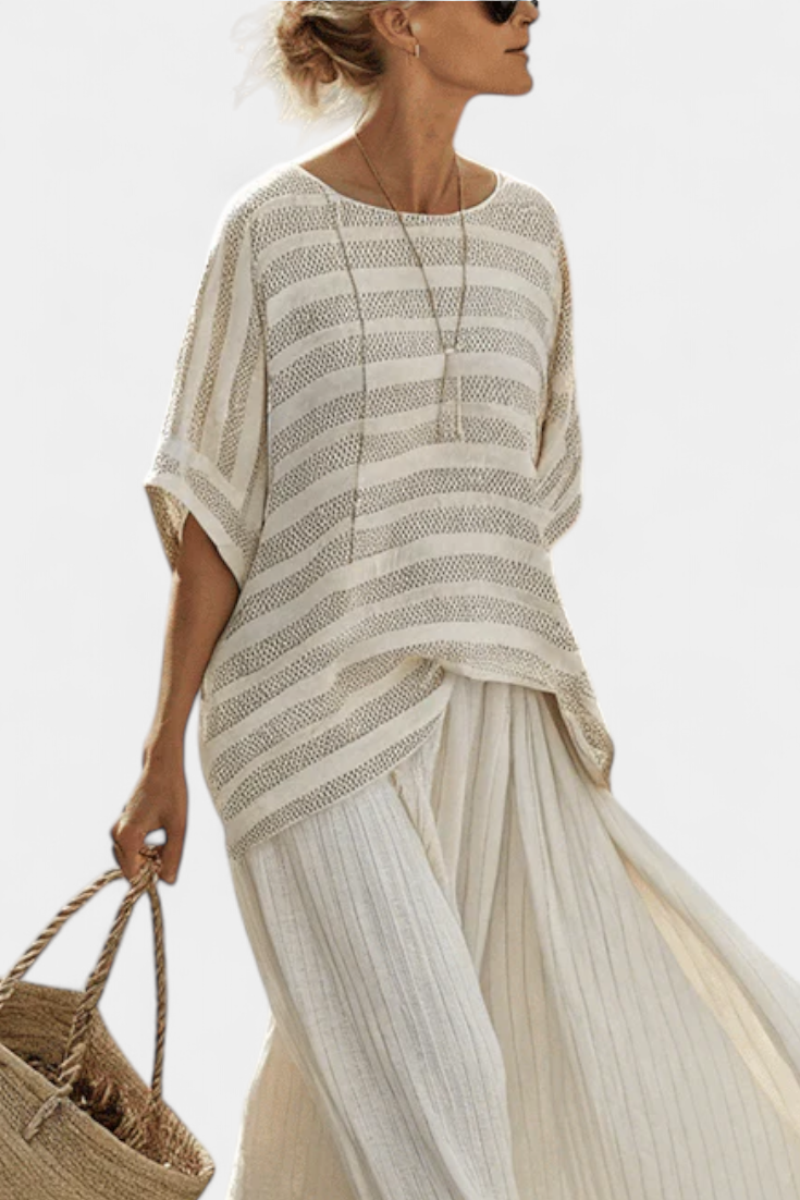 Linen set with a stylish striped blouse and flared trousers
