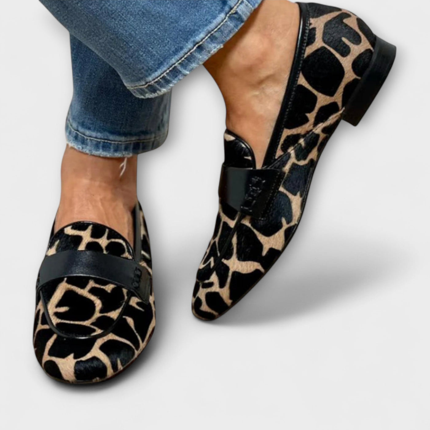 Giraffe print loafers