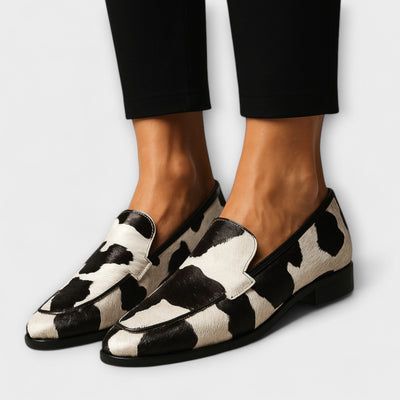 Bold cow print loafers