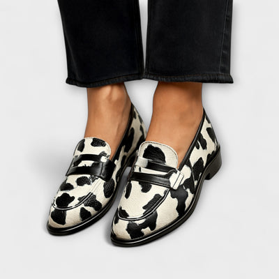 Cow print loafer flats