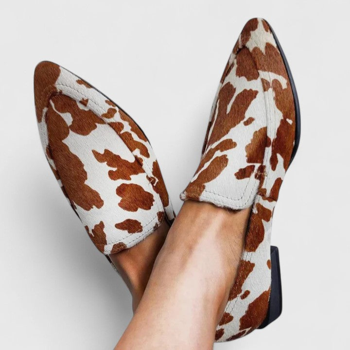 Cow print loafers