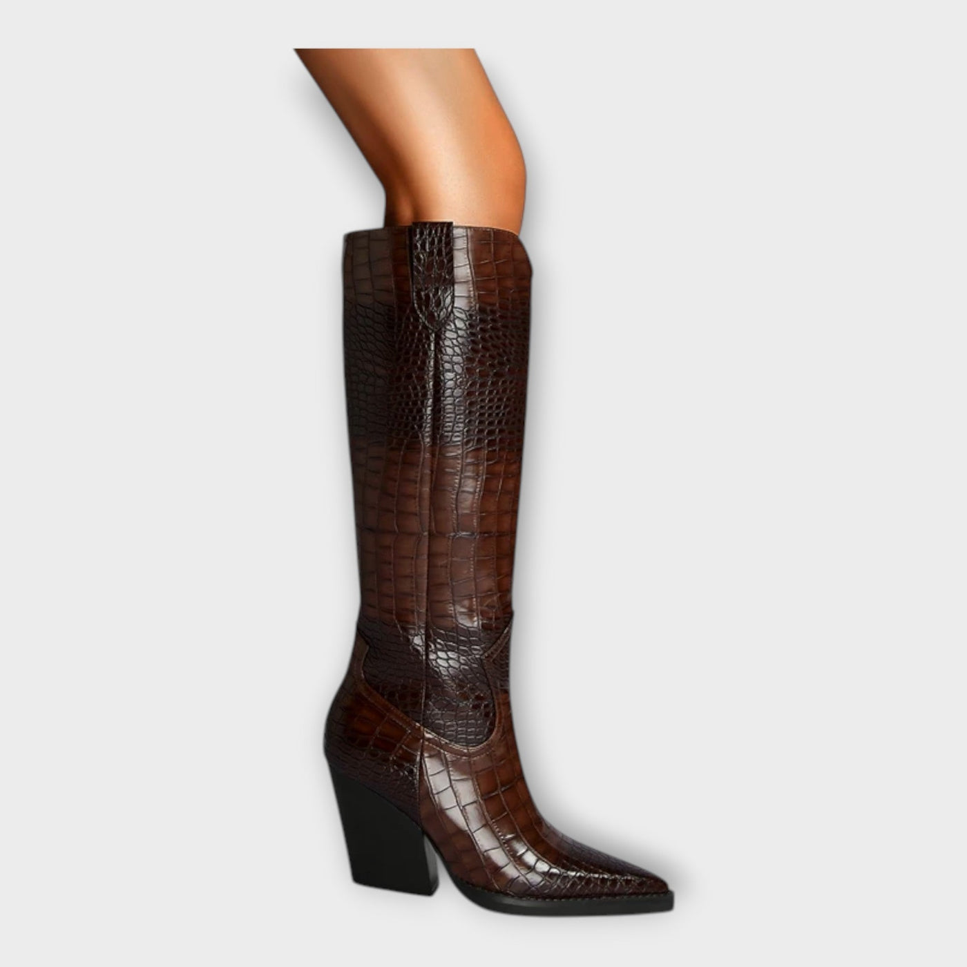 Knee-height leather boots with crocodile pattern