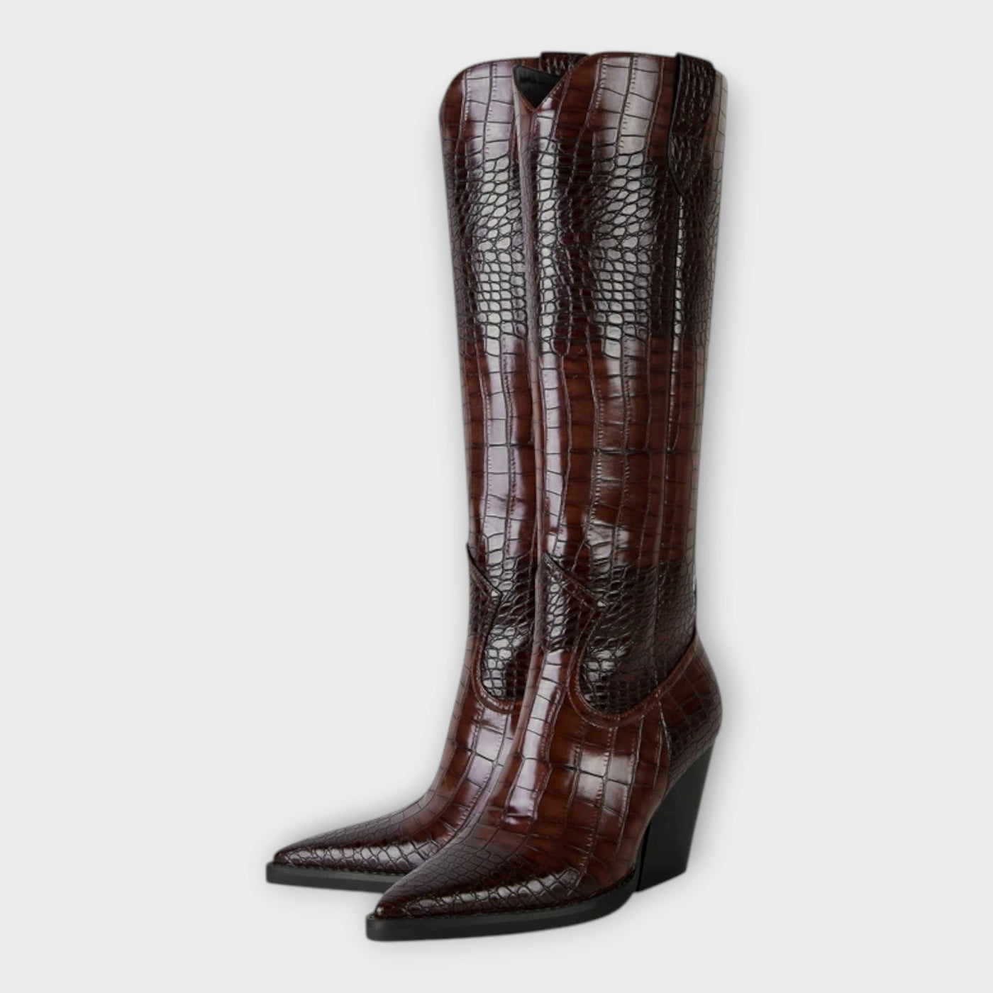 Knee-height leather boots with crocodile pattern