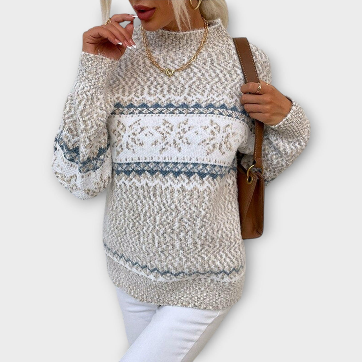 Knitted sweater with a snowflake pattern