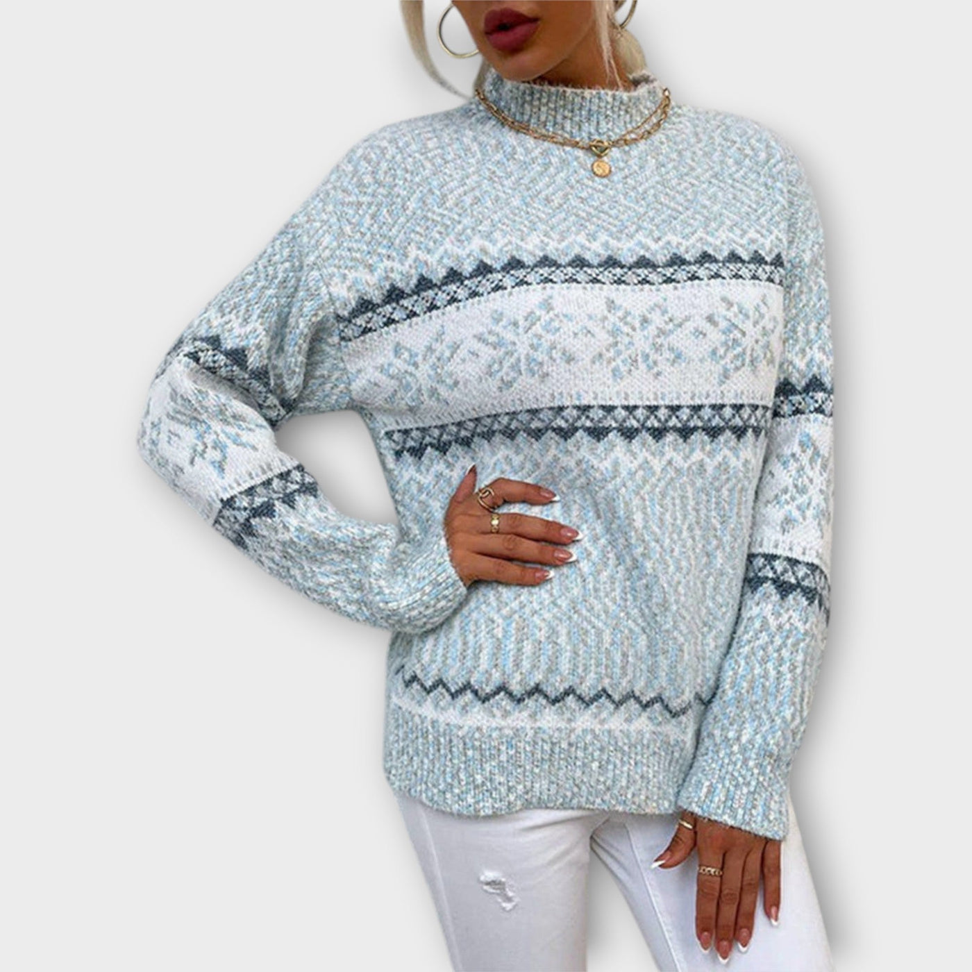 Knitted sweater with a snowflake pattern