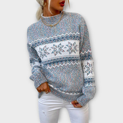 Knitted sweater with a snowflake pattern