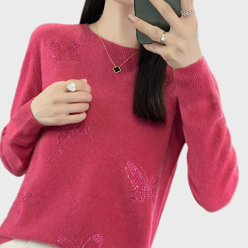 Knitted turtleneck with butterfly pattern