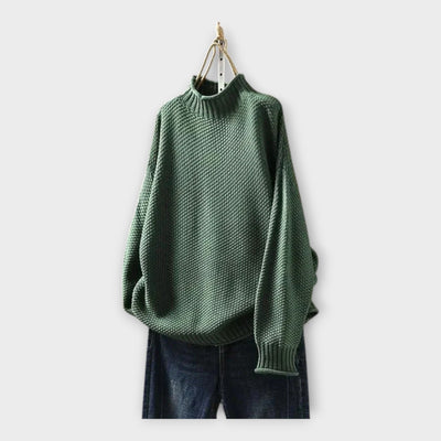 Knitted sweater with high collar