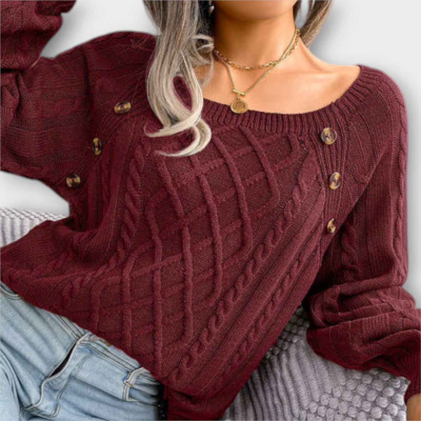 Knitted sweater with buttons