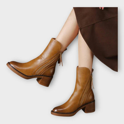 Ankle boots with elegant lines and a zipper