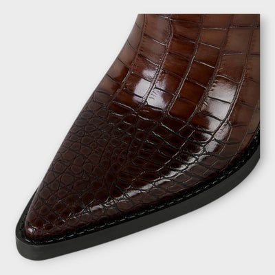 Knee-height leather boots with crocodile pattern