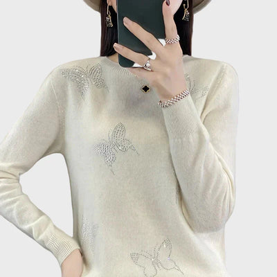Knitted turtleneck with butterfly pattern