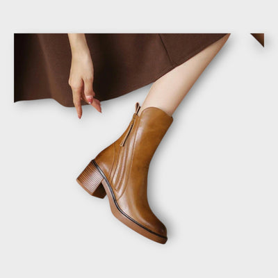 Ankle boots with elegant lines and a zipper