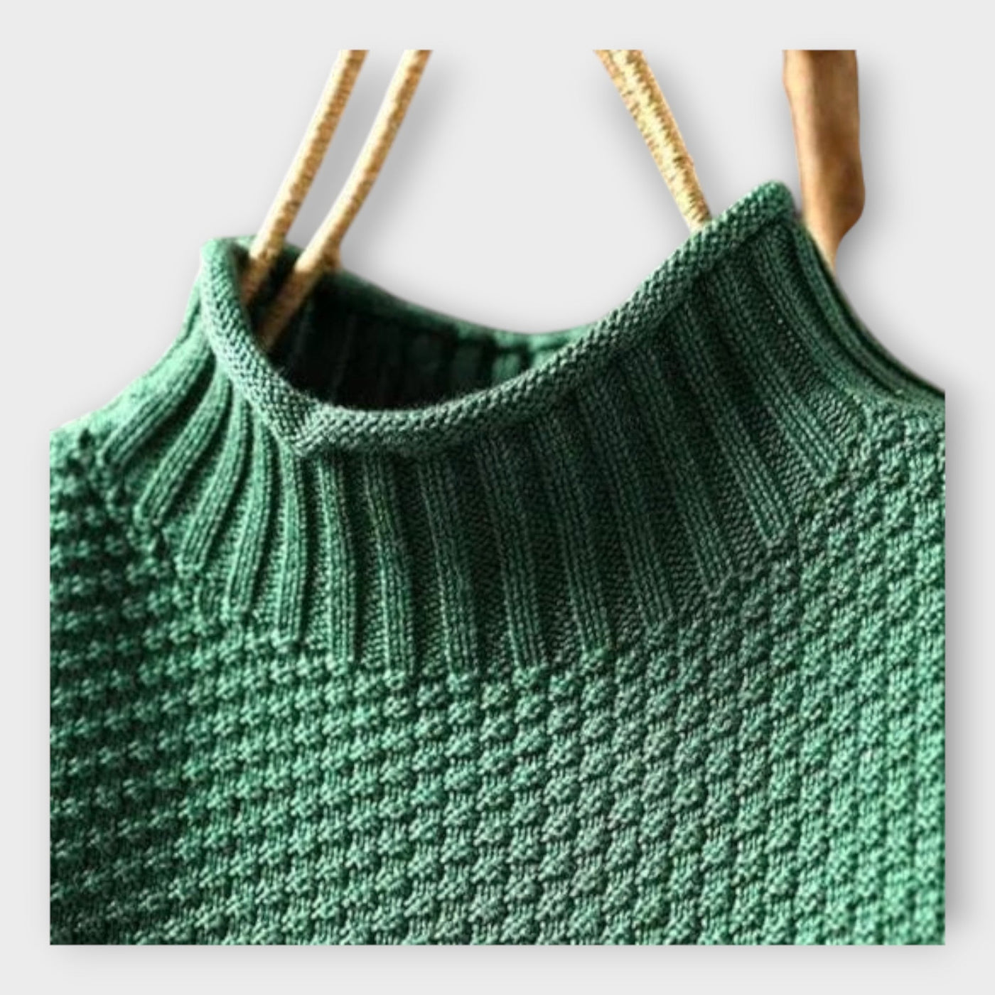 Knitted sweater with high collar
