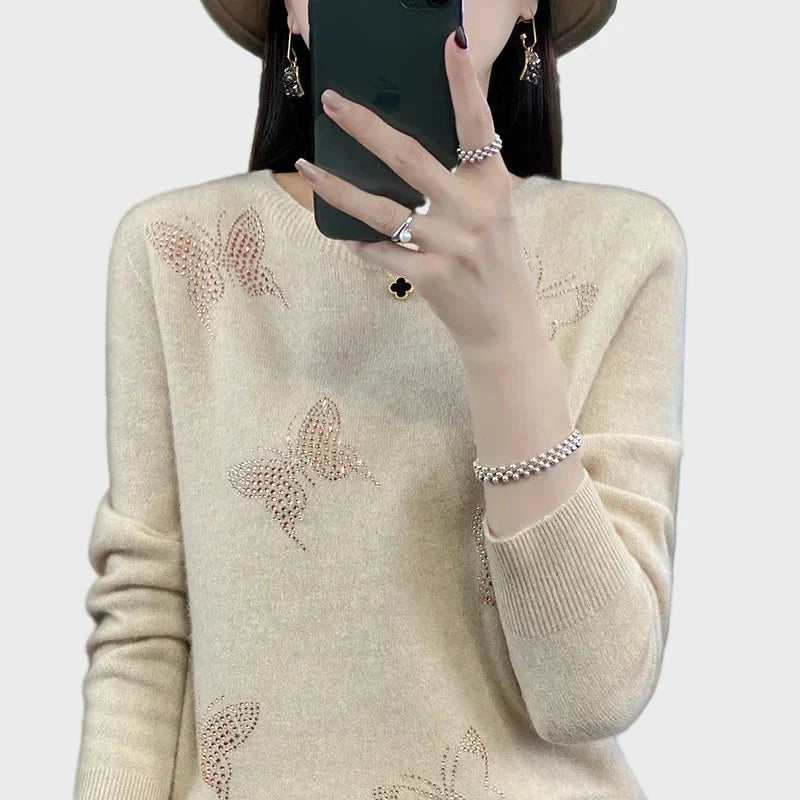 Knitted turtleneck with butterfly pattern