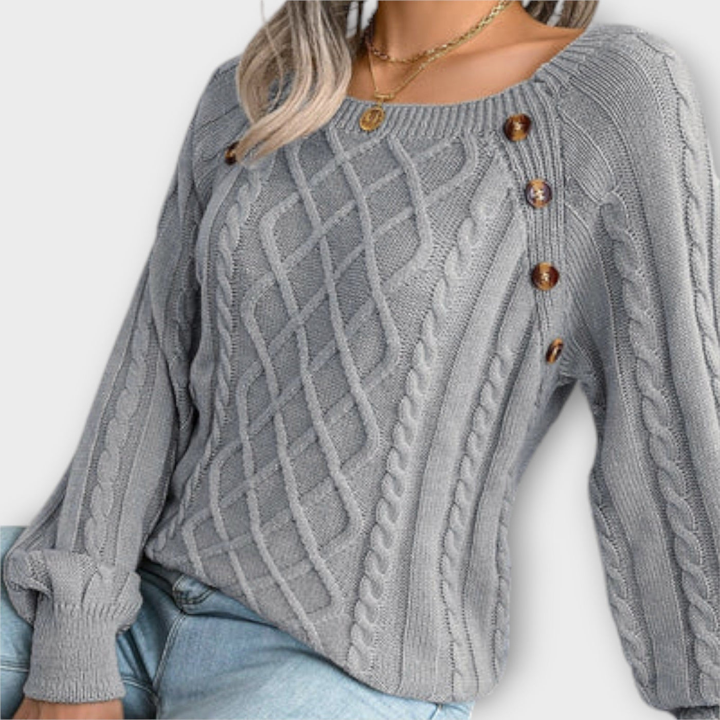 Knitted sweater with buttons