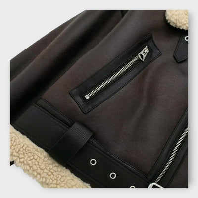 Short leather jacket with fur and belt