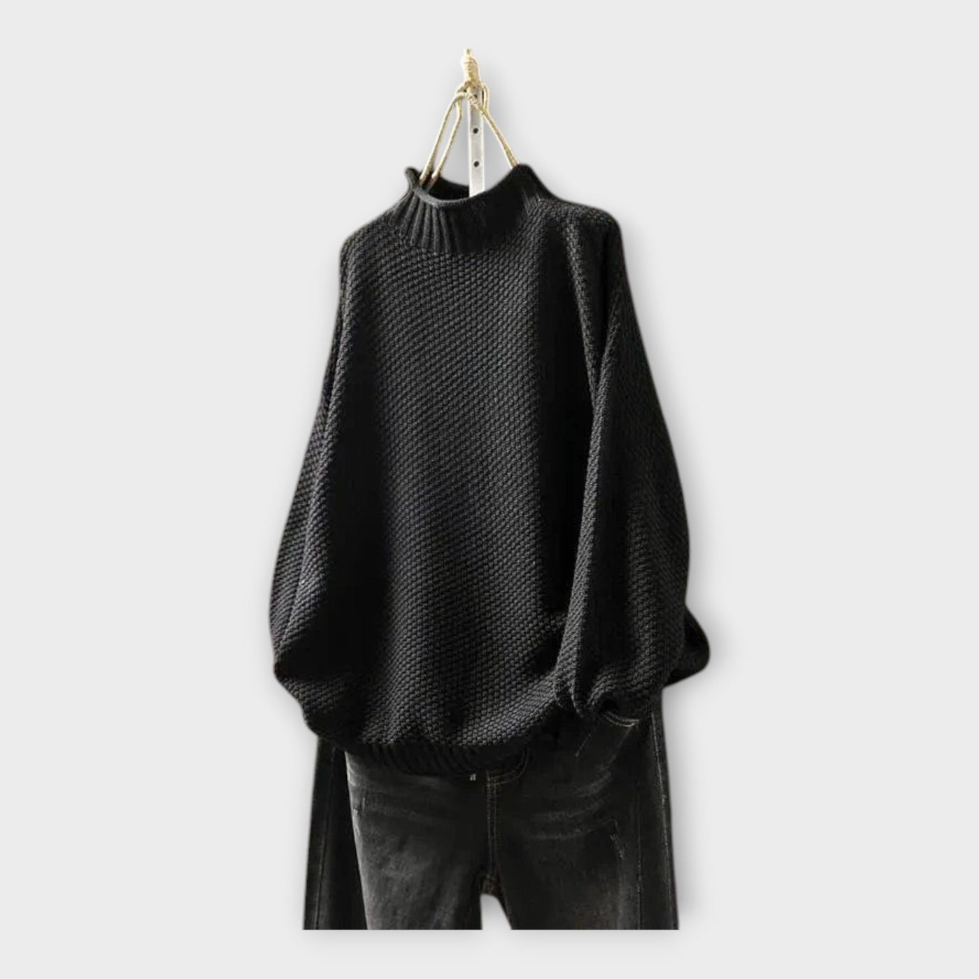 Knitted sweater with high collar