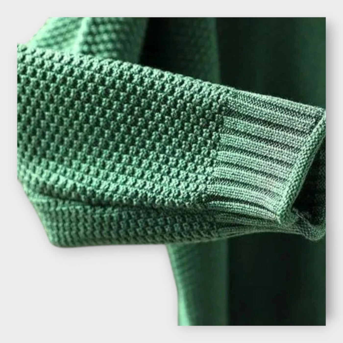 Knitted sweater with high collar