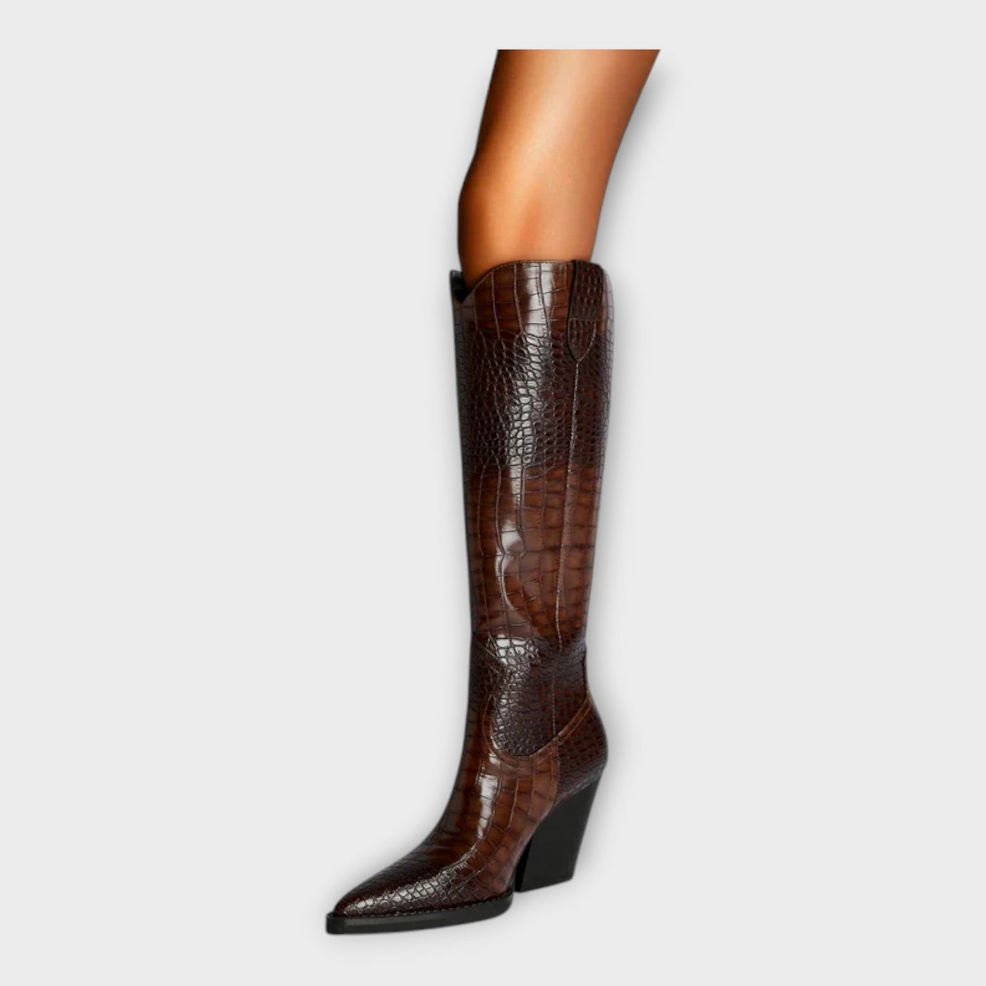 Knee-height leather boots with crocodile pattern