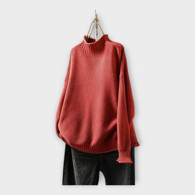 Knitted sweater with high collar