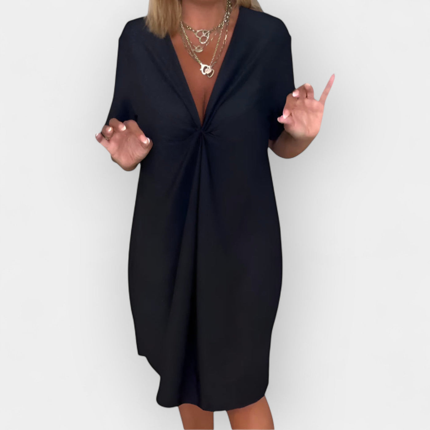 Elegant dress with a hem and V-neckline