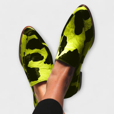 Cow print pointed-toe loafers