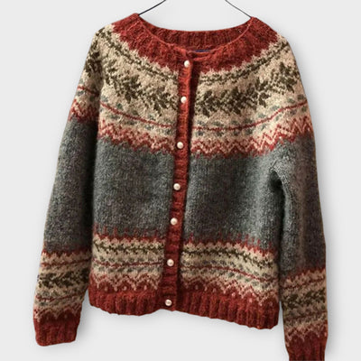 Knitted sweater with buttons and festive pattern