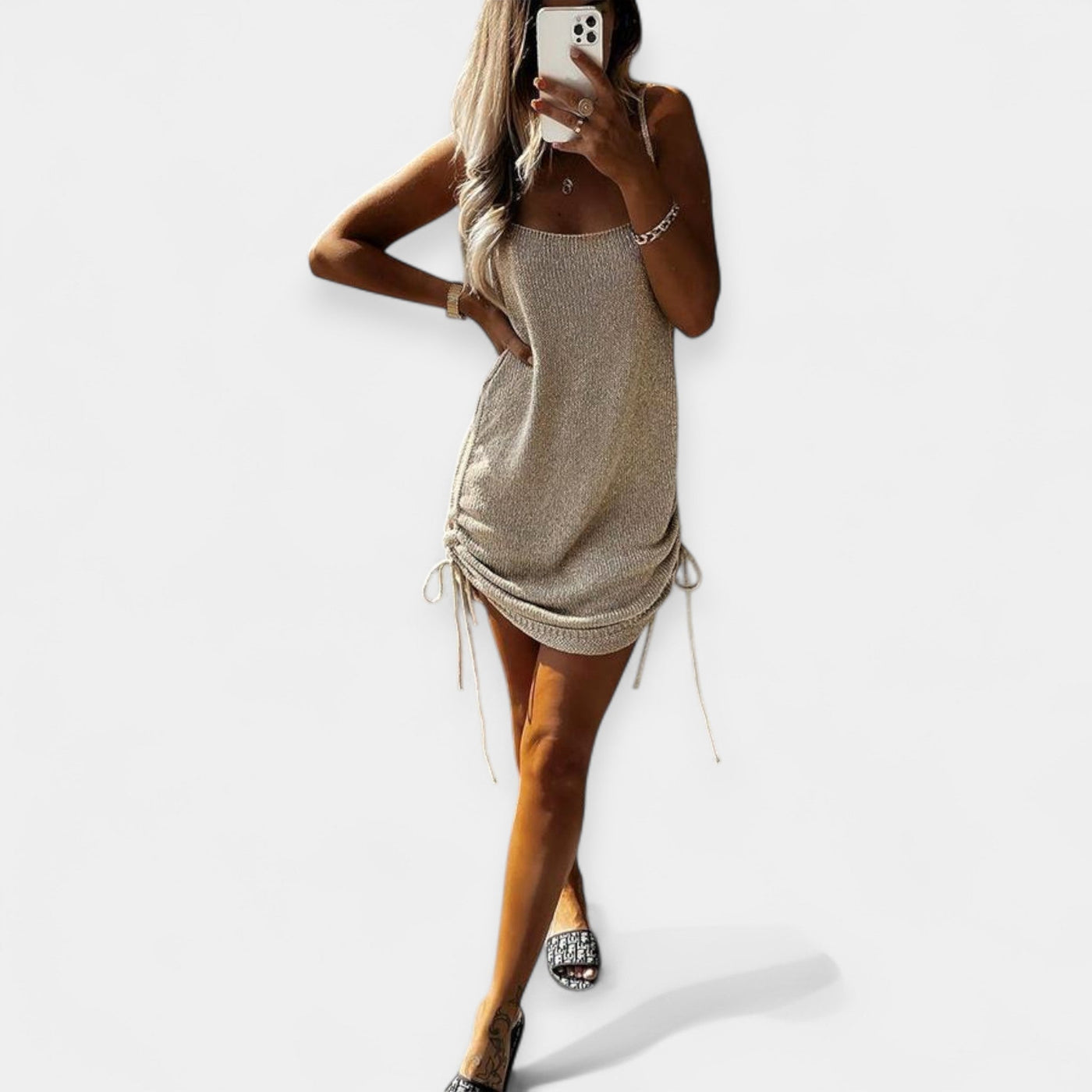 Sleeveless knitted dress with tie