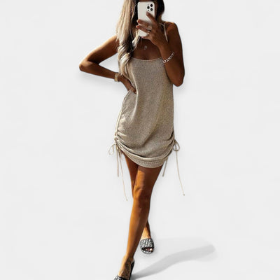 Sleeveless knitted dress with tie