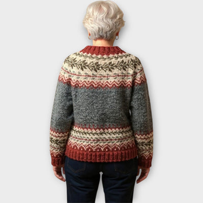 Knitted sweater with buttons and festive pattern