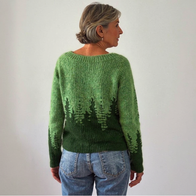 Knitted sweater with a nature-inspired pattern