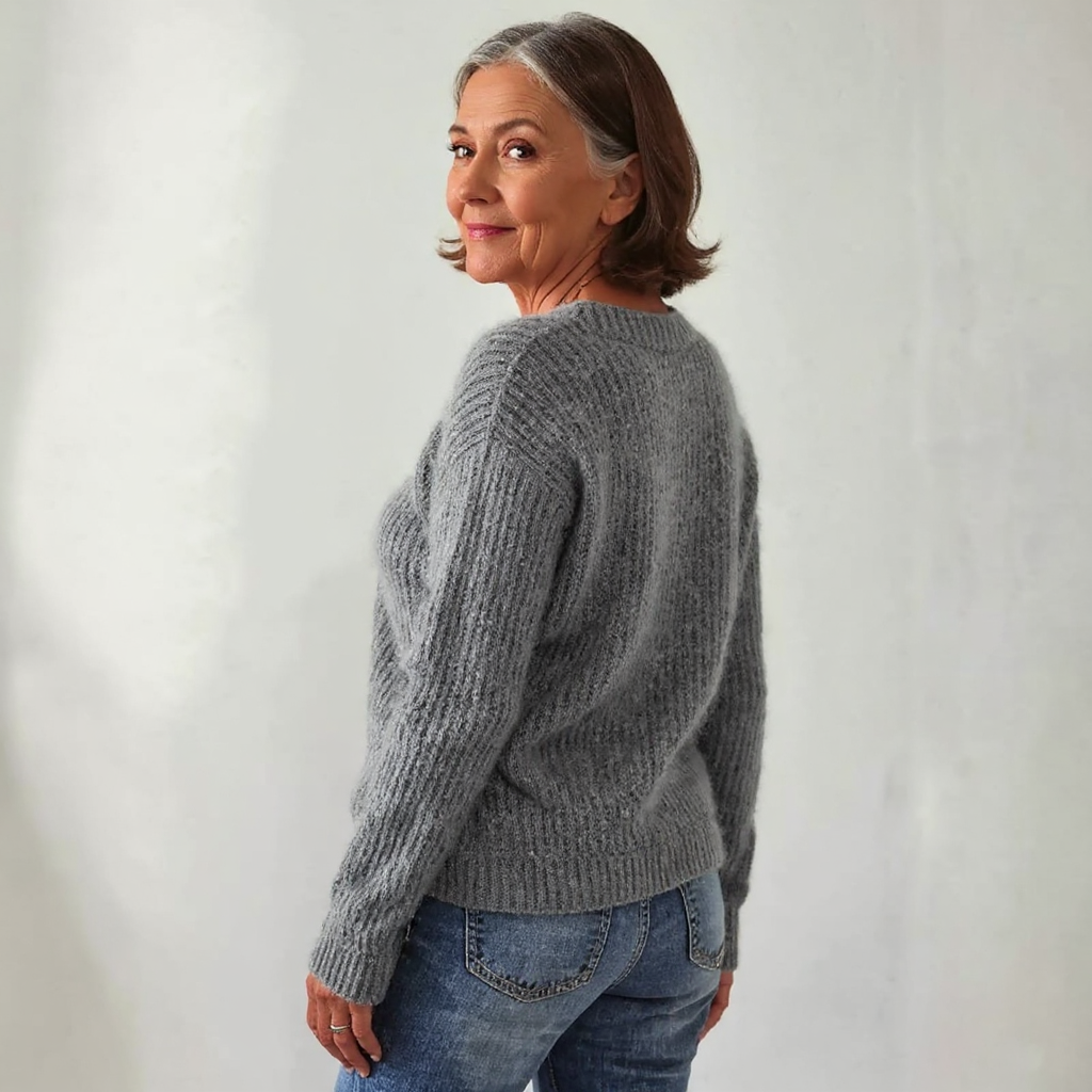 Knitted sweater with sheep pattern