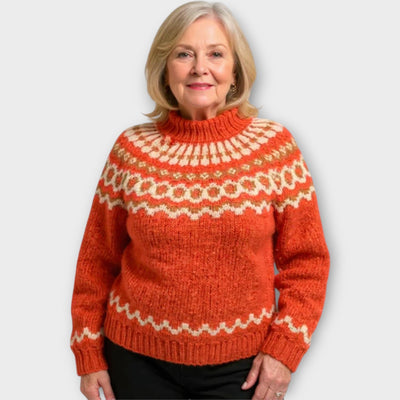 Knitted sweater with patterned collar