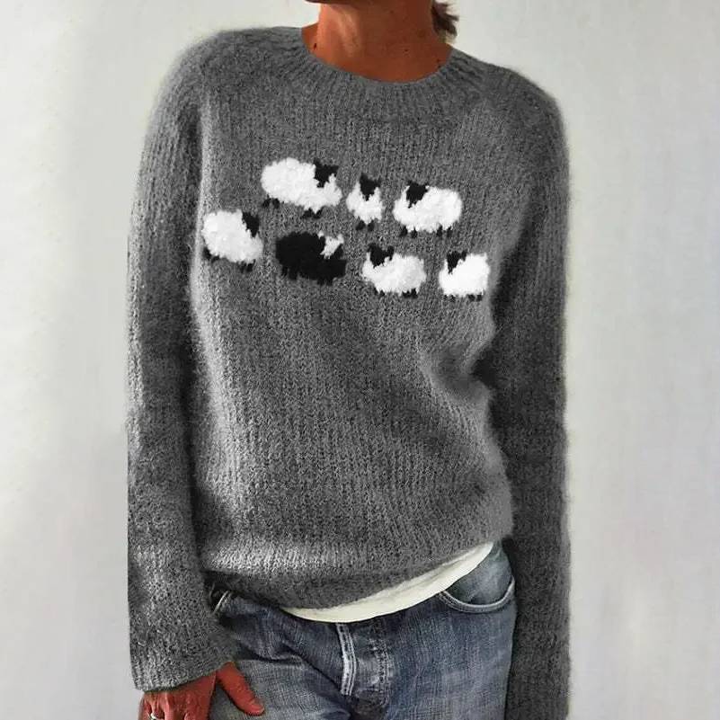 Knitted sweater with sheep pattern