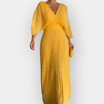 Pleated dress with elegant lines